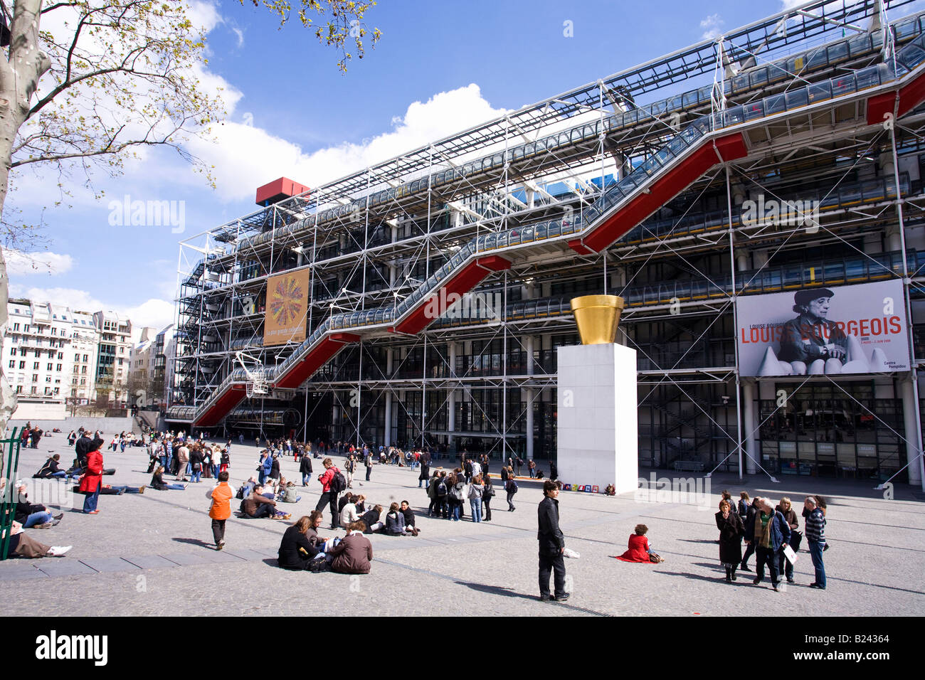 Pompidou Centre Modern Art Gallery Museum in spring sunshine with students and visitors daytime exterior Paris France Europe Stock Photo