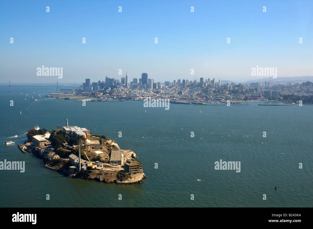 An aerial view of Alcatraz Bay Bridge and San Francisco skyline Stock Photo