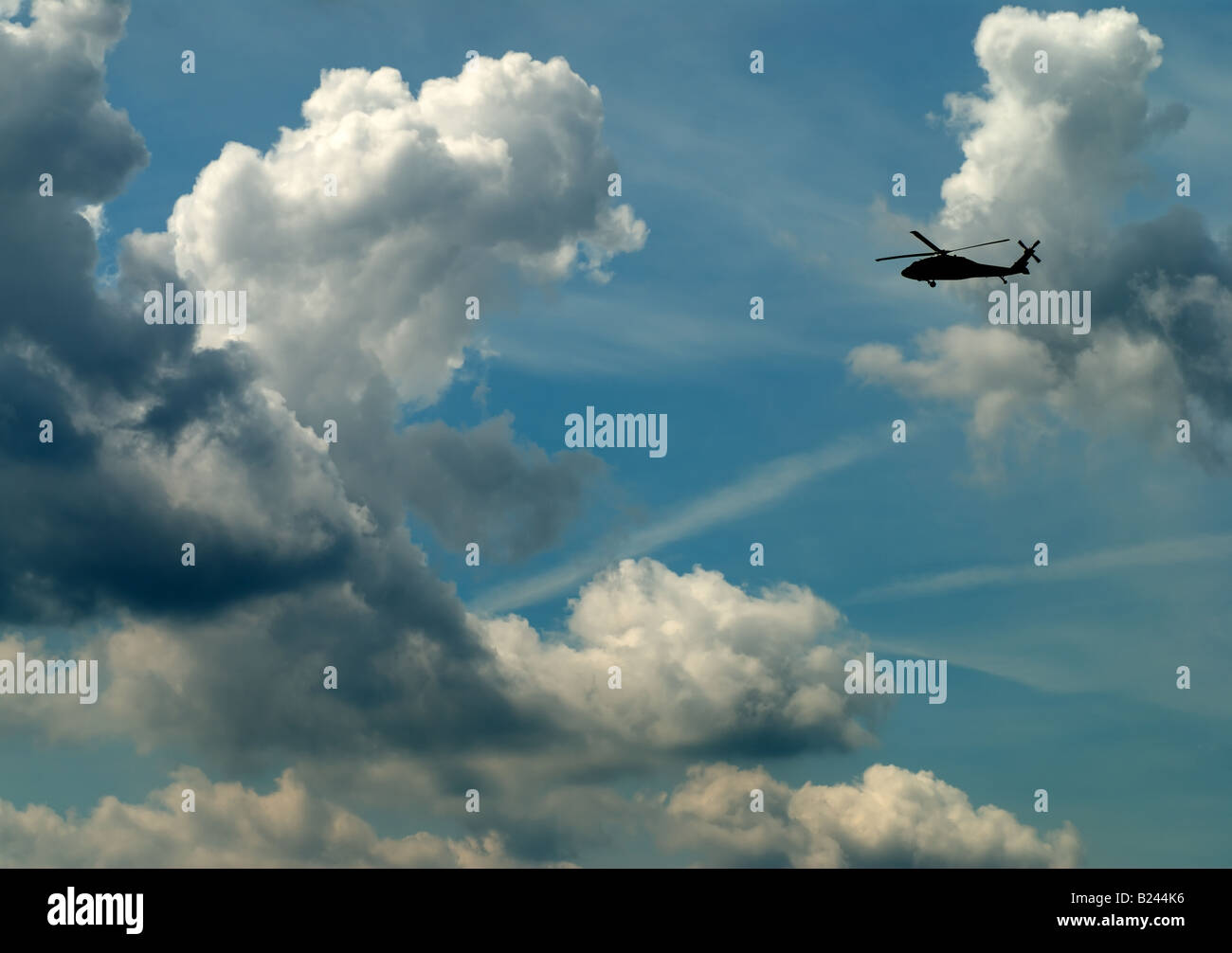 White blue helicopter flying hi-res stock photography and images - Alamy