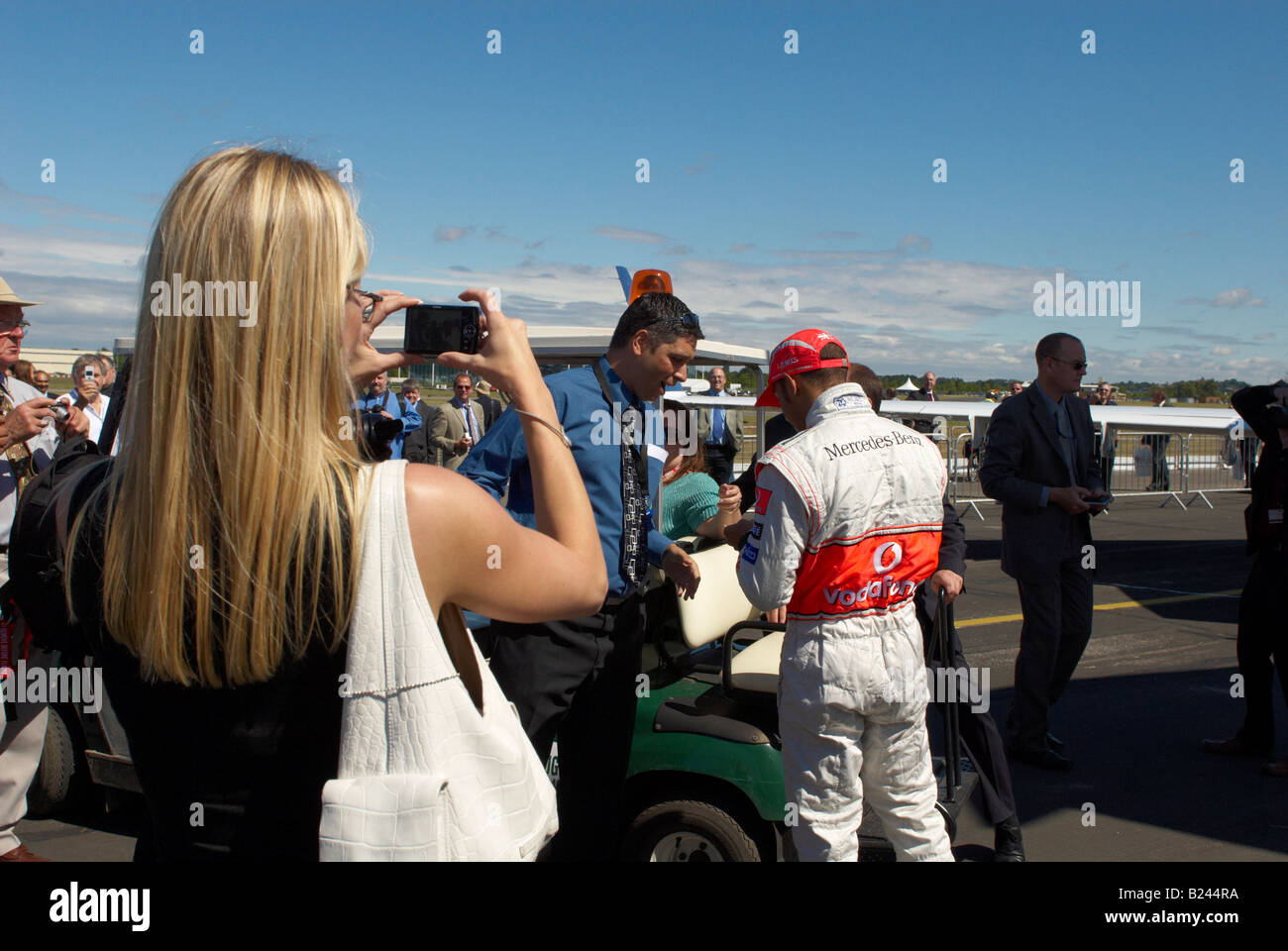 Lewis Hamilton signing an autograph Farnborough Air Show 2008 Stock ...