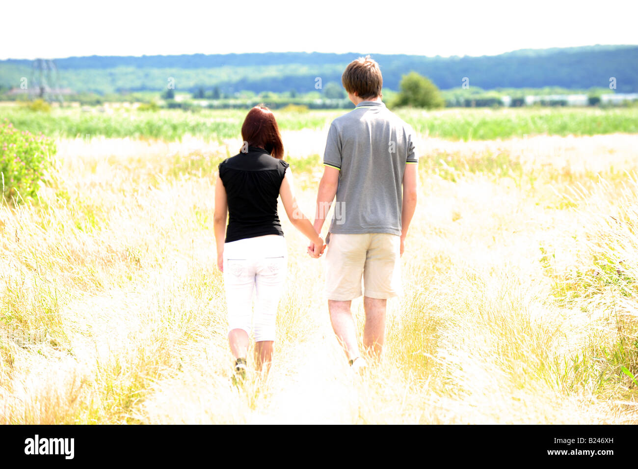 Man walking down country lane hi-res stock photography and images - Alamy