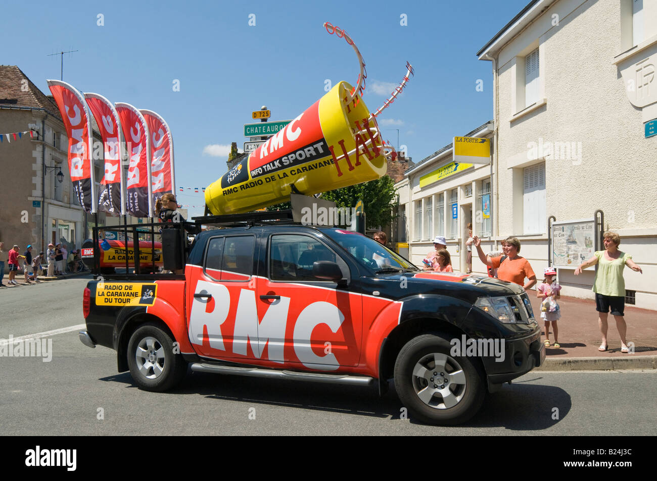 2008 Tour de France caravan - Nissan vehicle sponsored by "RMC" radio  station, France Stock Photo - Alamy