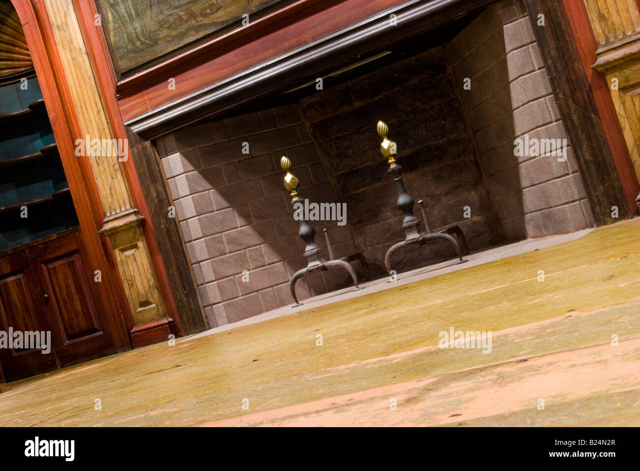 Large fireplace and wood floor in an old house Stock Photo - Alamy