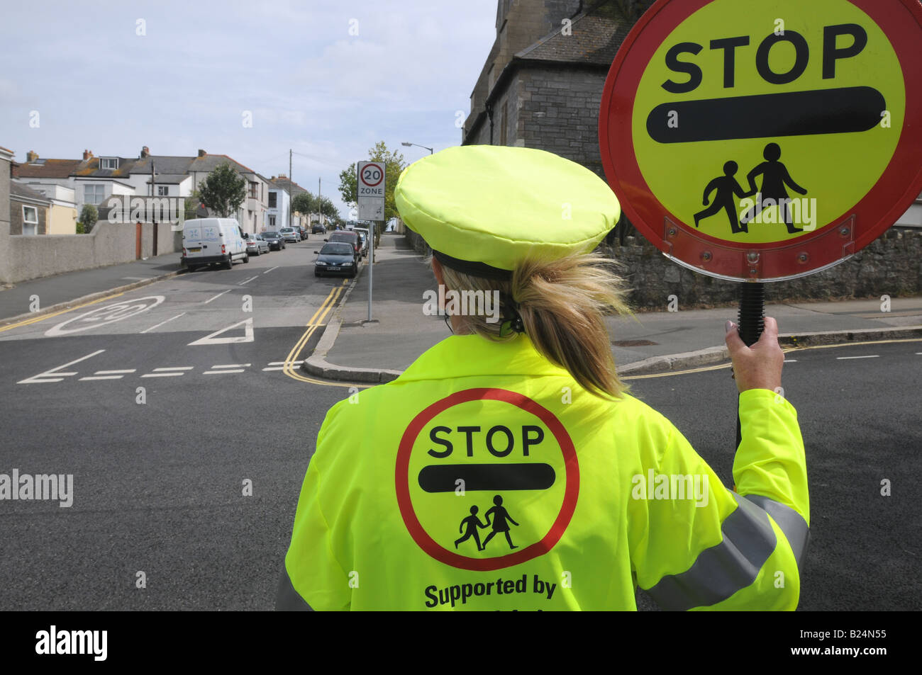 English lollipop lady holding sign. Stock Photo
