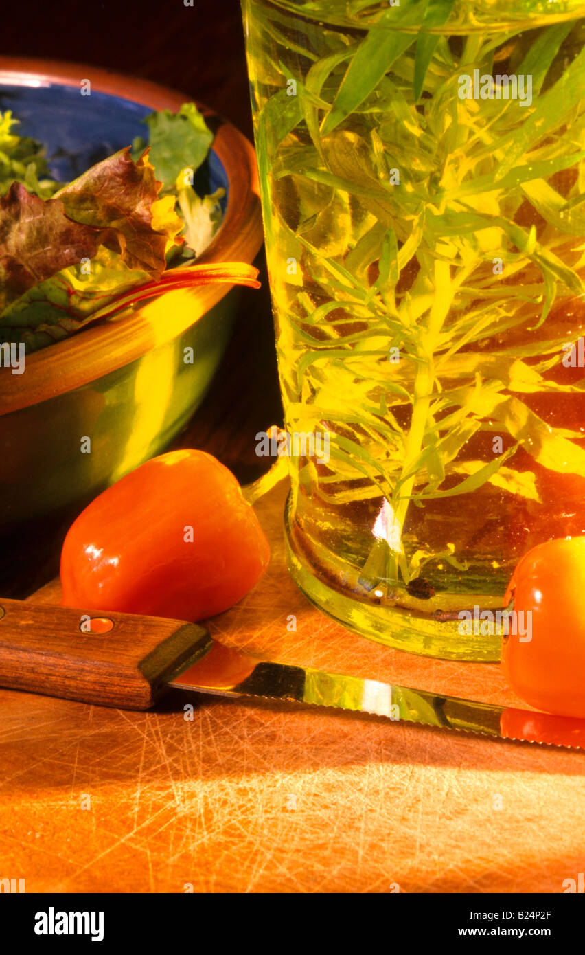 HERB OLIVE OIL HOT PEPPERS AND SALAD GREENS Stock Photo Alamy