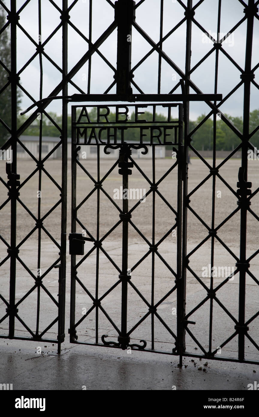 arbeit macht frei in iron gate in the jourhaus gatehouse at the entrance to the prisoner compound at Dachau concentration camp Stock Photo