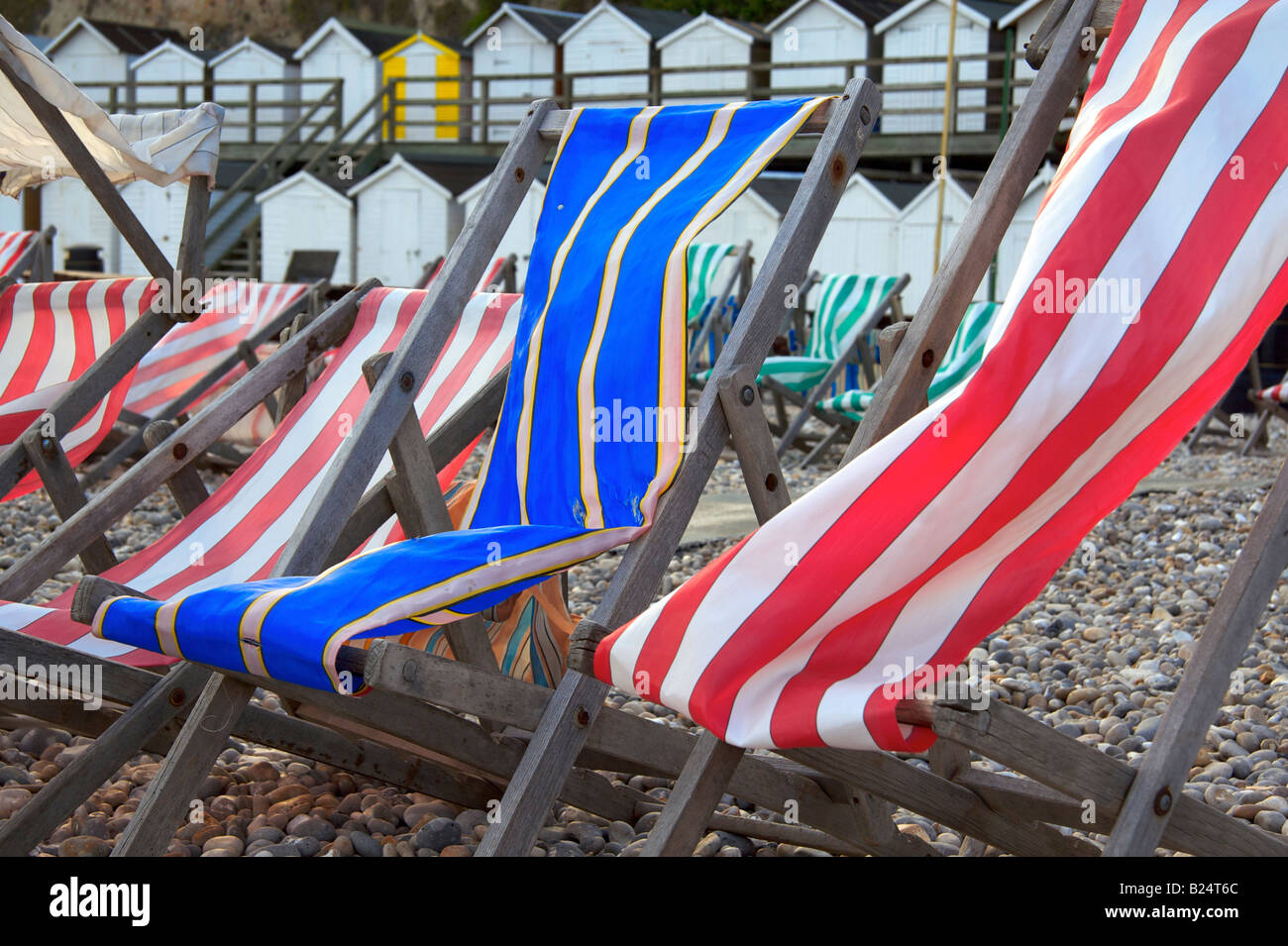 Deckchairs on the beach in Beer, Devon Stock Photo