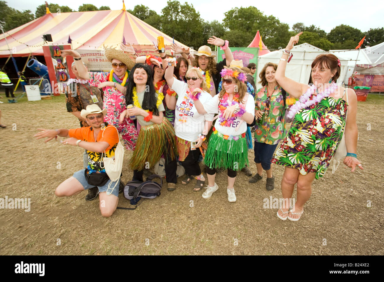 Hawaiian fancy dress at the Glastonbury Festival 2008 Stock Photo - Alamy