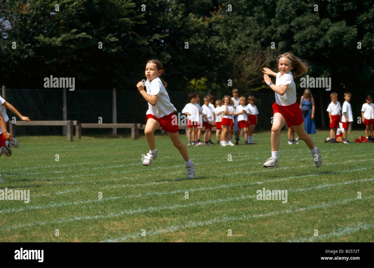 Primary School Sports Day Girls Running Stock Photo
