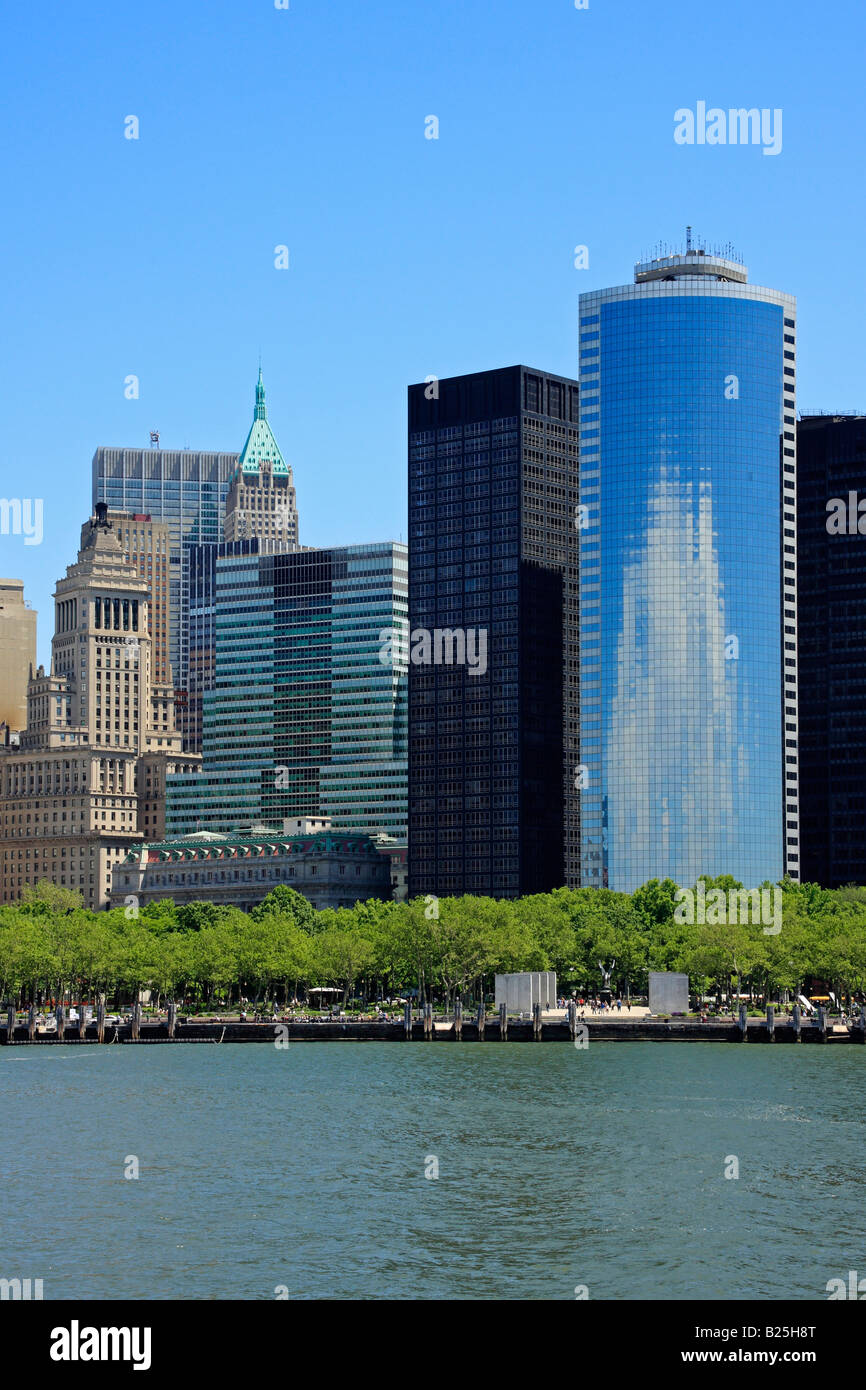 Lower Manhattan buildings and Hudson river from the Liberty Island ferry - New York City, USA Stock Photo