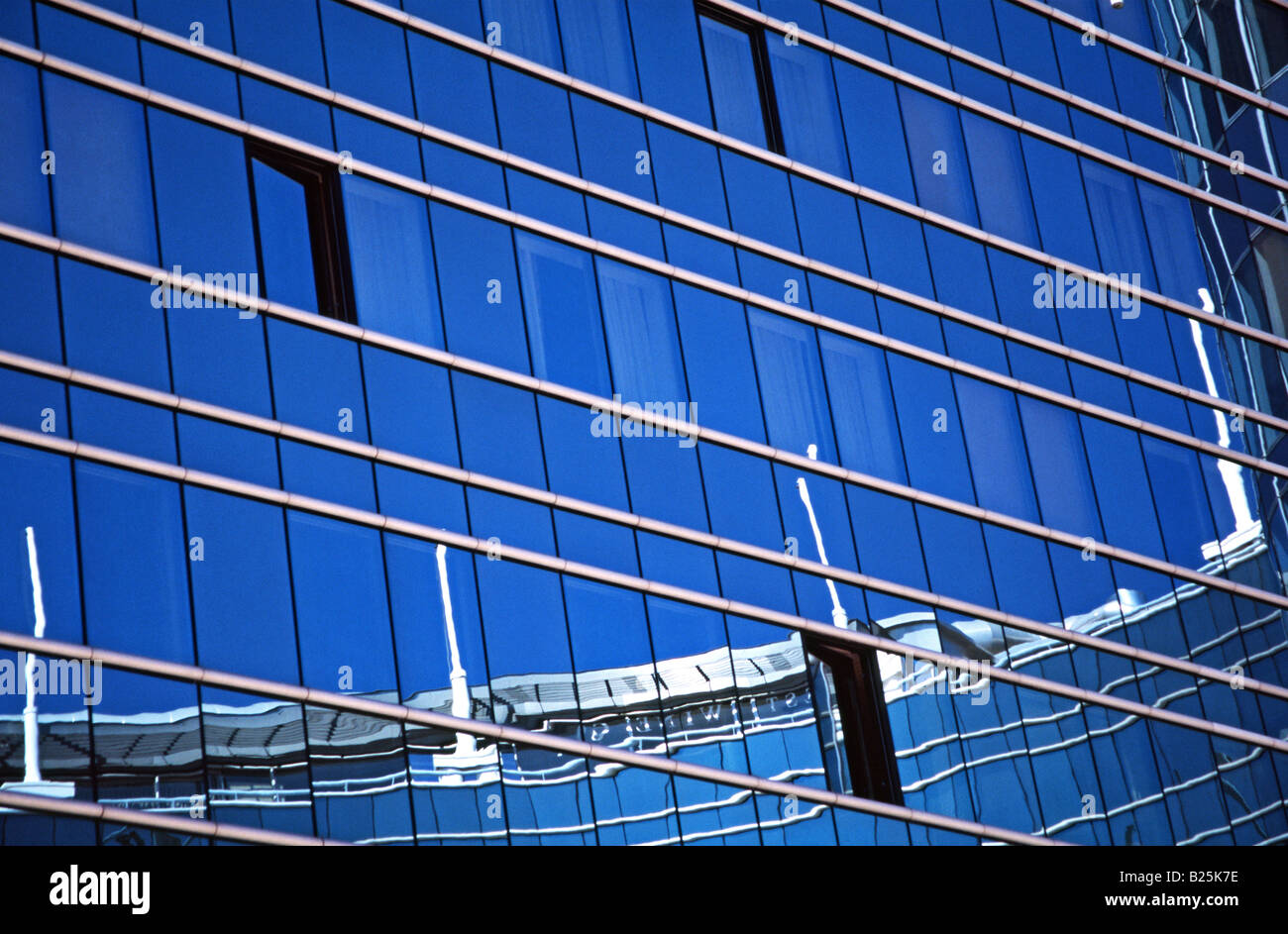 Reflexions on a blue glass wall in the Chartrons district, in Bordeaux Stock Photo