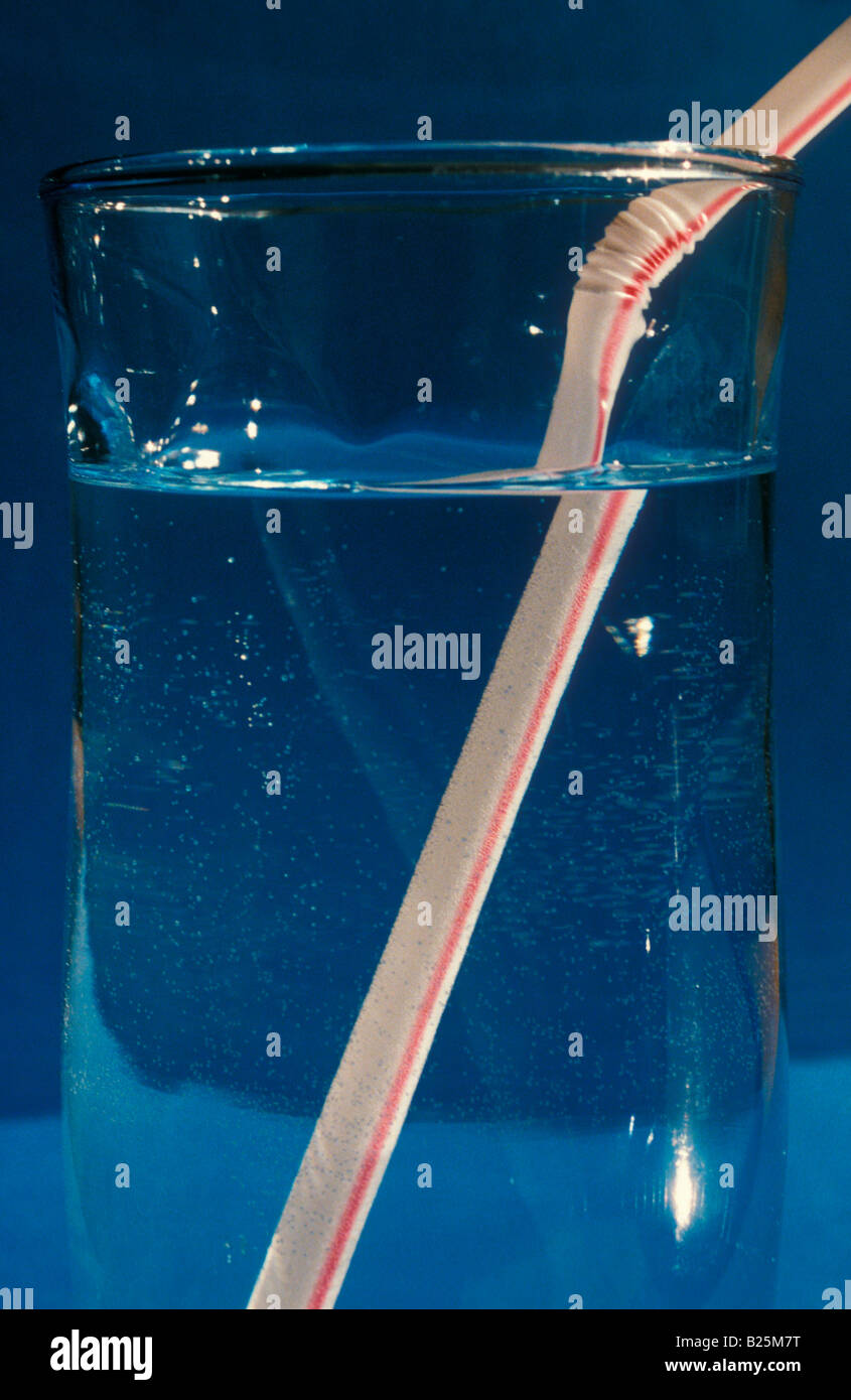  Light  refraction glass of water  and straw Stock Photo Alamy