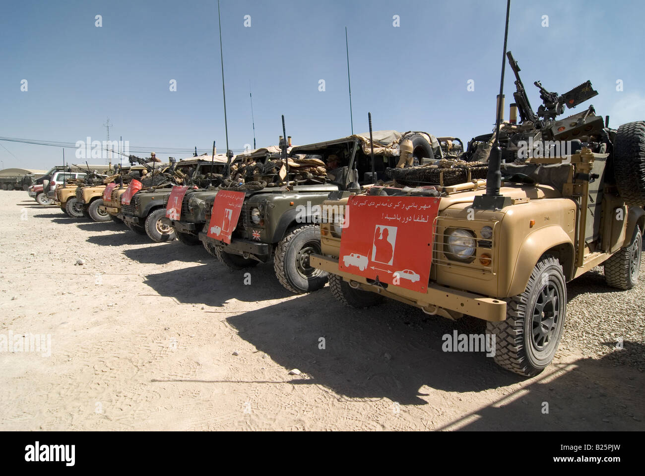 RAF landrovers lined up ready to go on patrol at Kandahar airfield ...