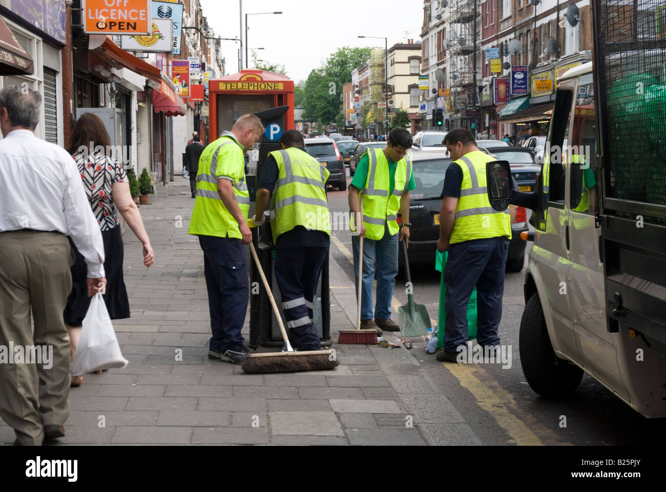 Inefficient council road sweepers in Haringey London England UK Stock Photo