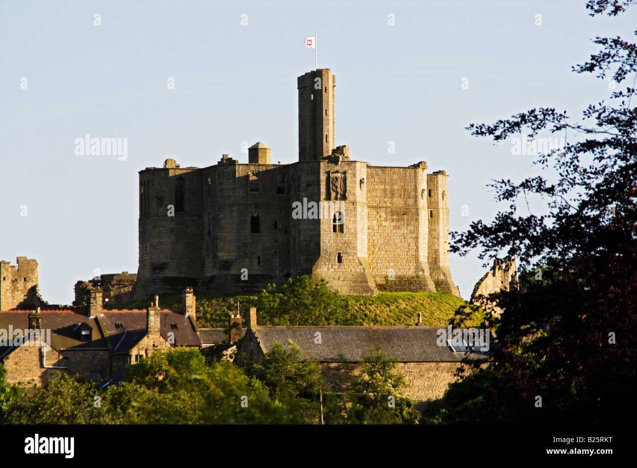 Warkworth Castle with cottages in front at Northumberland, England