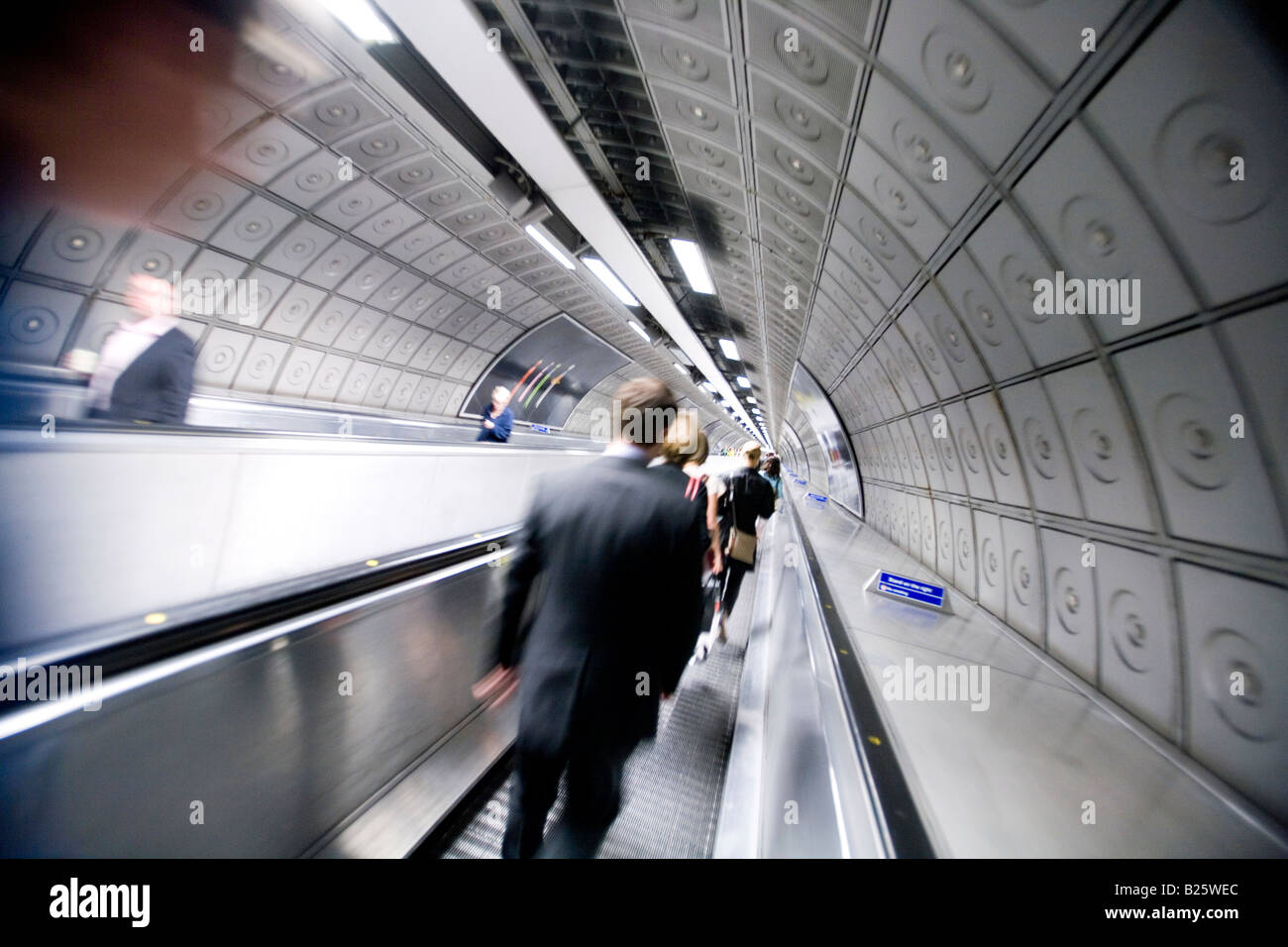 Passengers on travelator at London Underground station England UK Stock Photo