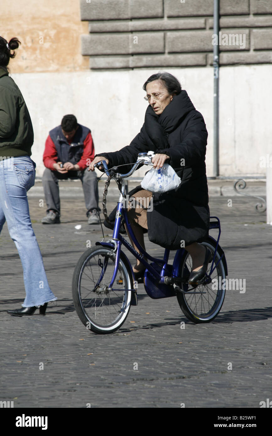 old woman on bike
