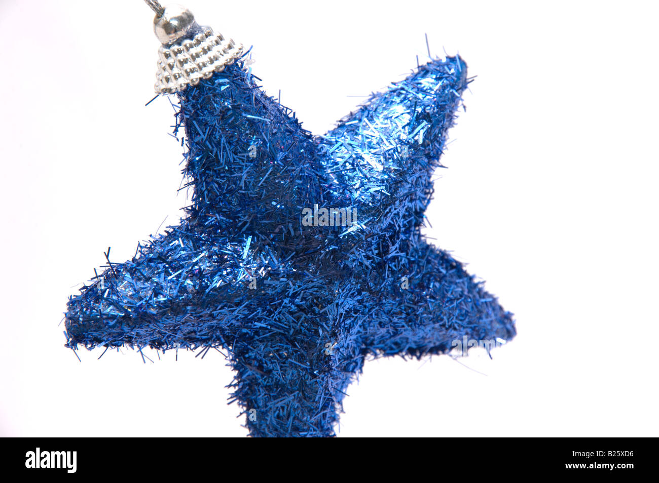 Festive blue tinsel sparkly star tree decoration 2/3 Stock Photo