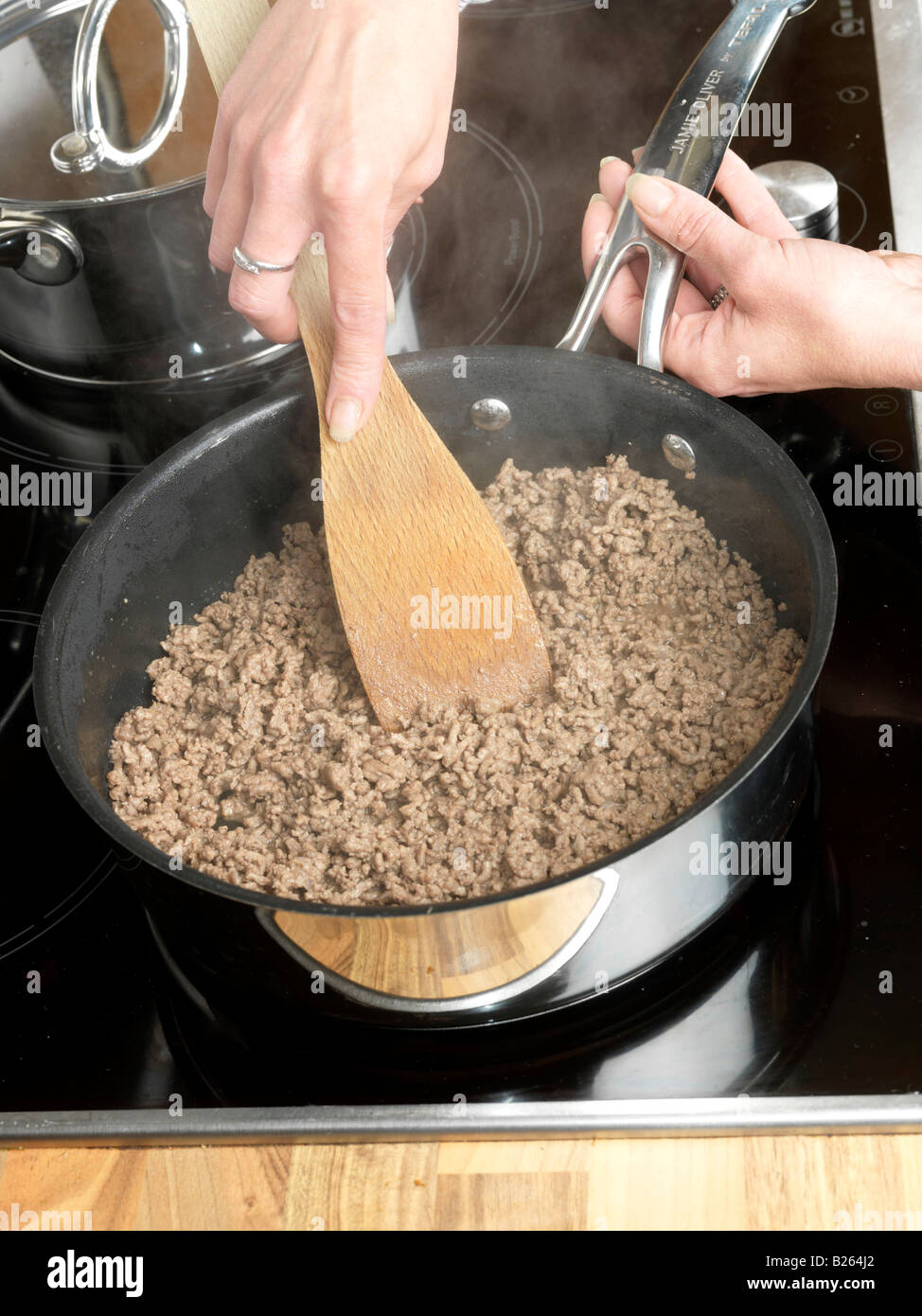 Woman Browning Minced Beef Model Released Stock Photo Alamy