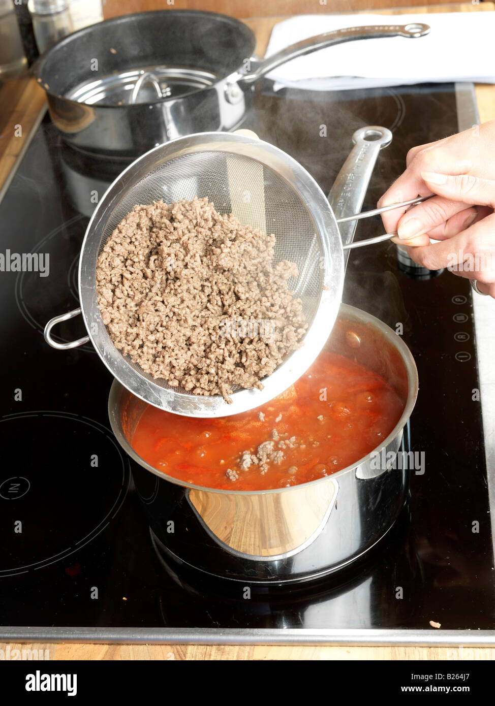 Woman Making Lasagne Model Released Stock Photo