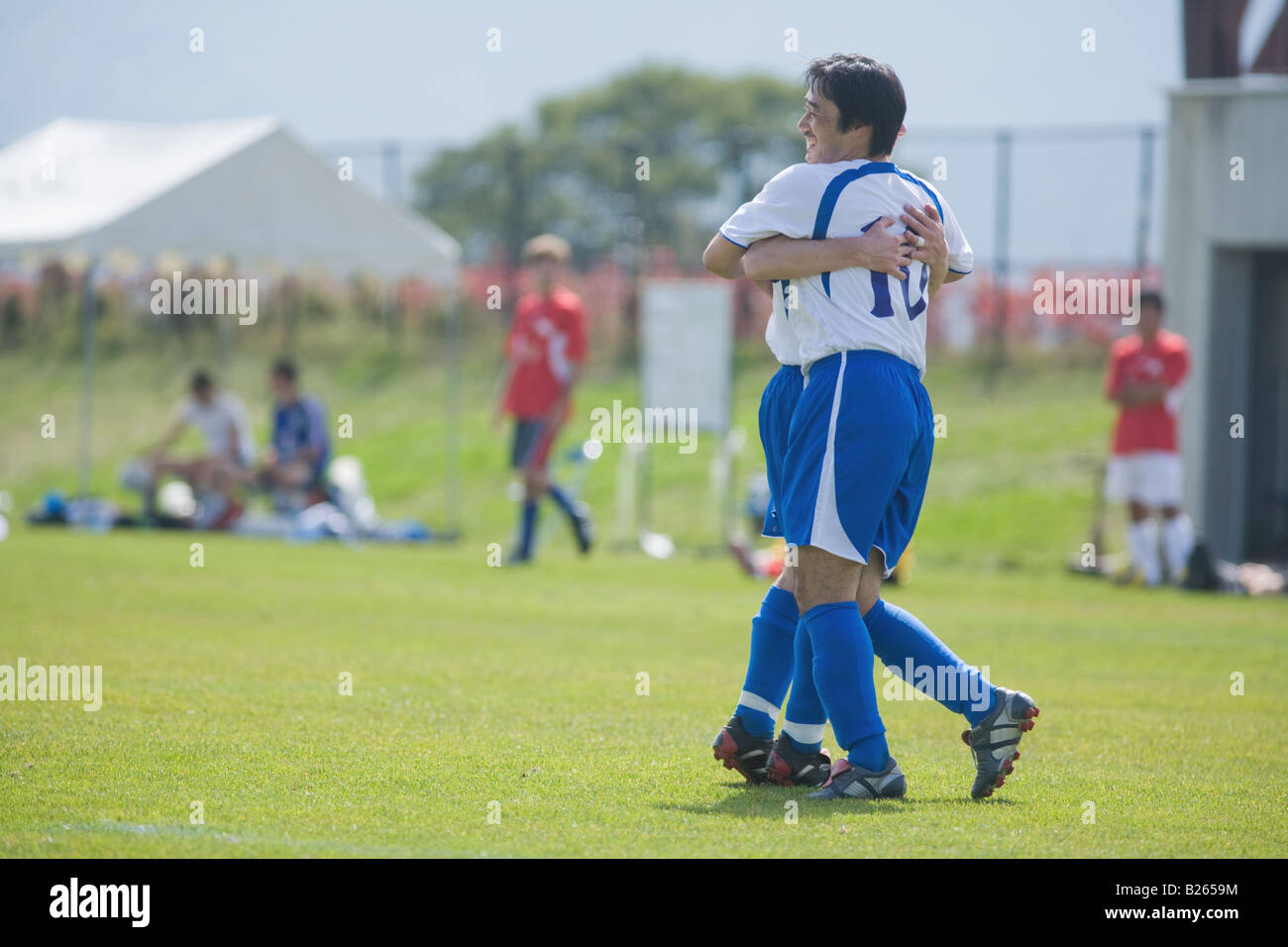 Soccer Players Celebrating Stock Photo - Alamy