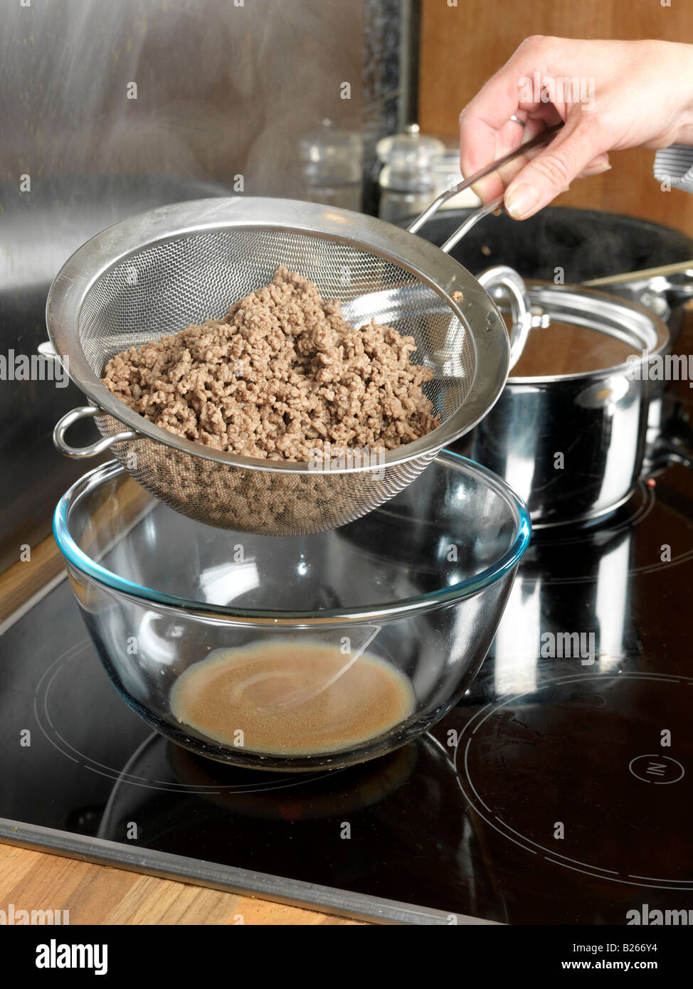Preparing Delicious Homemade Italian Minced Beef Bolognese Lasagne