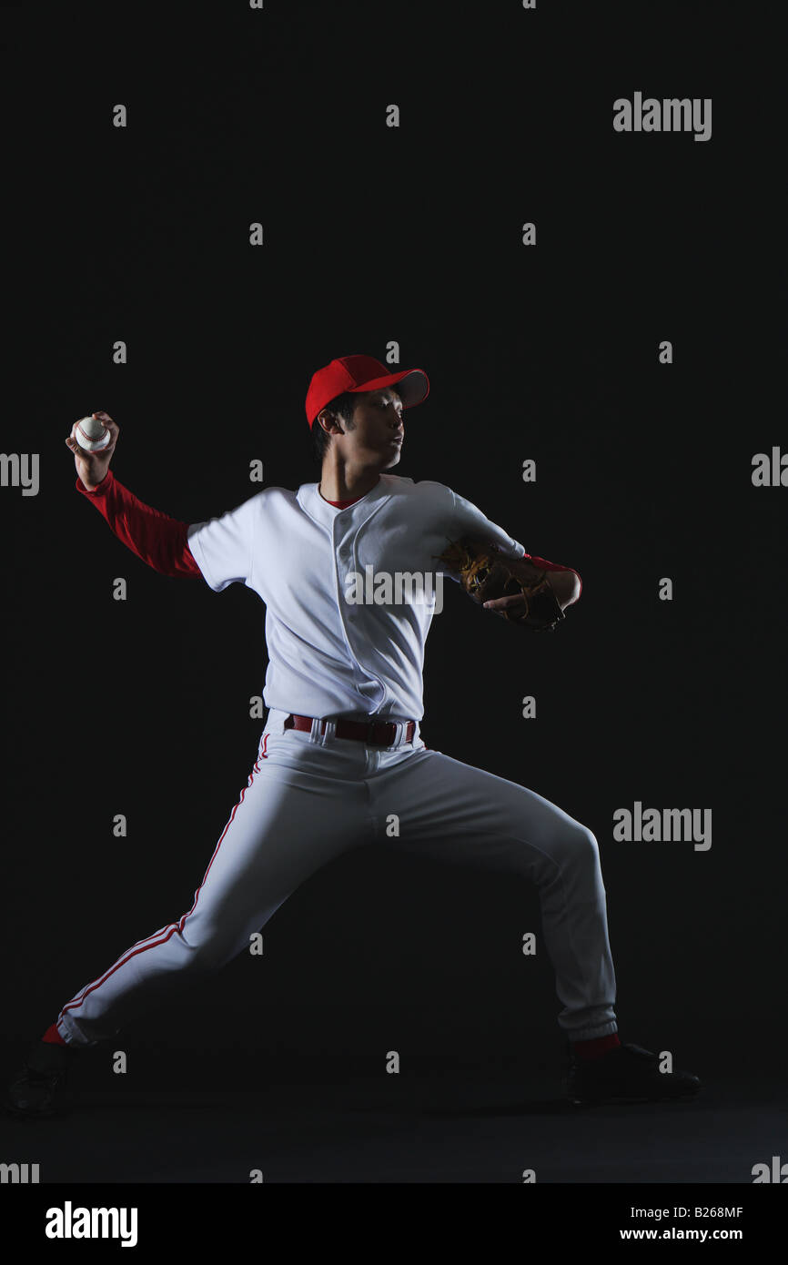Pitcher Throwing Baseball Stock Photo Alamy