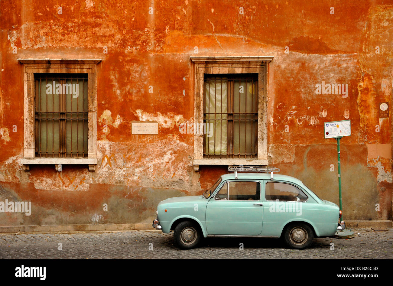 Wall of house with a Fiat 850 in front, Trastevere, Rome, Italy Stock Photo