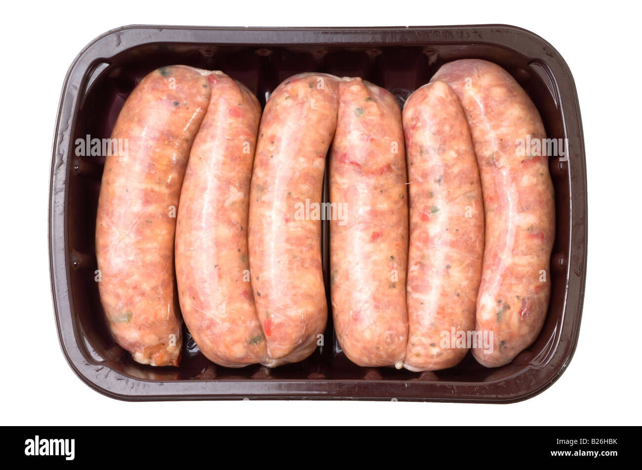 6 British pork jalapeno chilli sausages in a plastic tray Stock Photo
