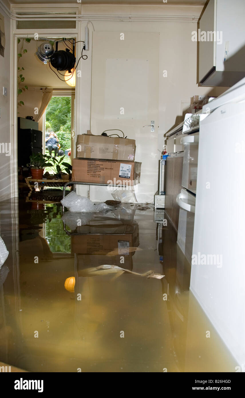 Rising Groundwater Floods Inside Kitchen of Basement Flat Home of Tony Mills Abingdon Road Oxford 27 July 2007 Stock Photo