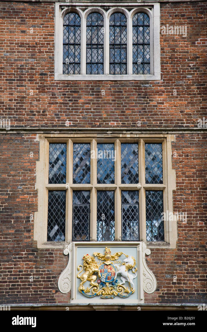 Window and a crest on the front of the Hospital of the Blessed Trinity or Abbot's Hospital, Guildford, Surrey, England. Stock Photo