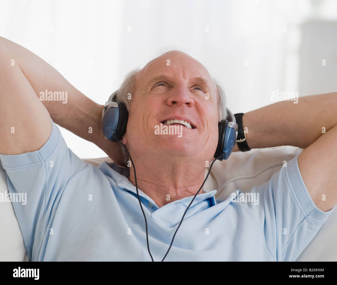 Seated man reclining hi-res stock photography and images - Alamy