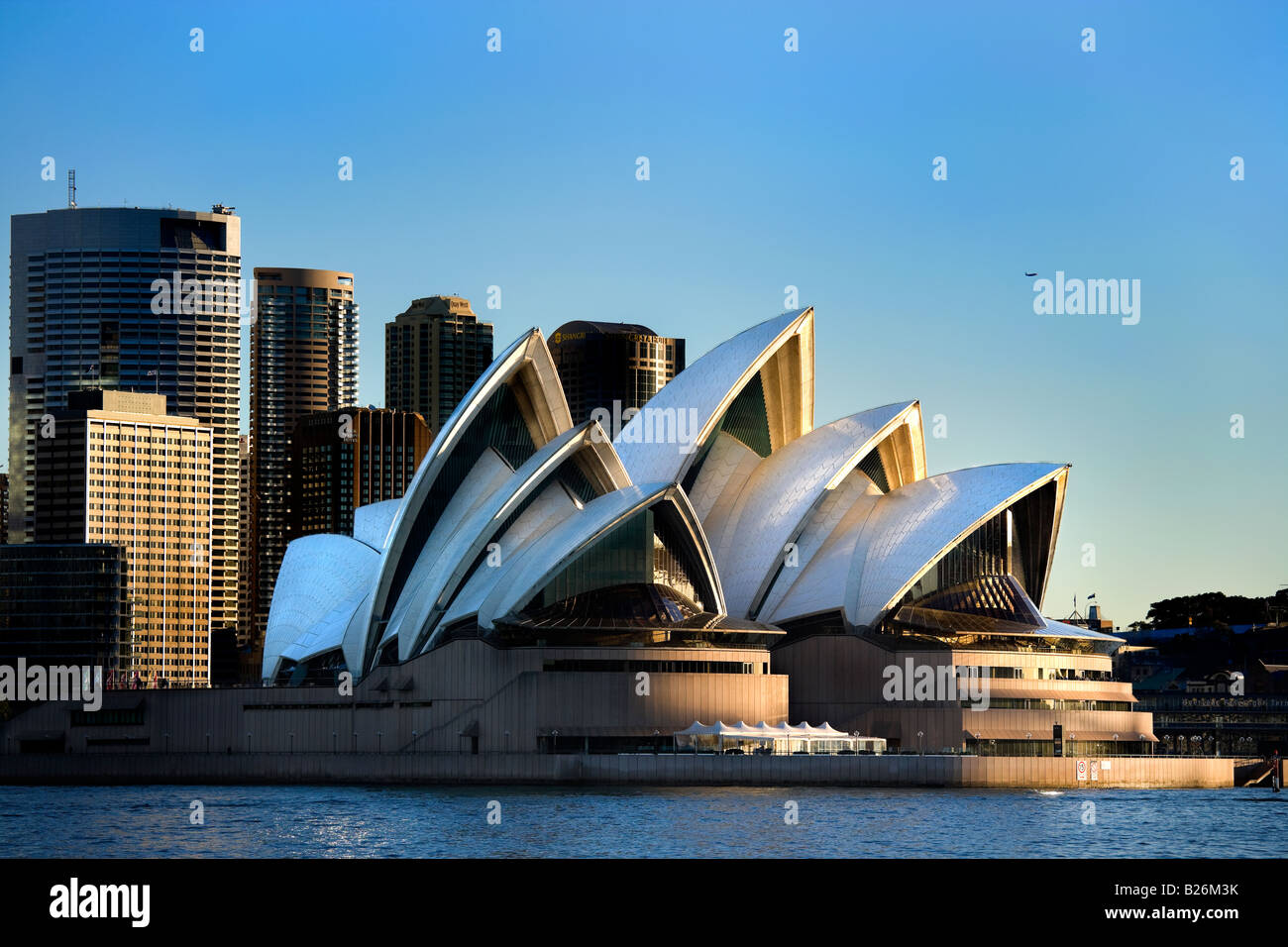 Sydney Opera House with downtown skyline. Bennelong Point in Sydney Harbour, NSW, Australia Stock Photo