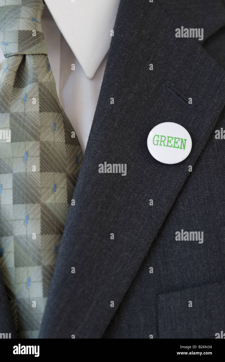 Eco-friendly button on businessman’s lapel Stock Photo
