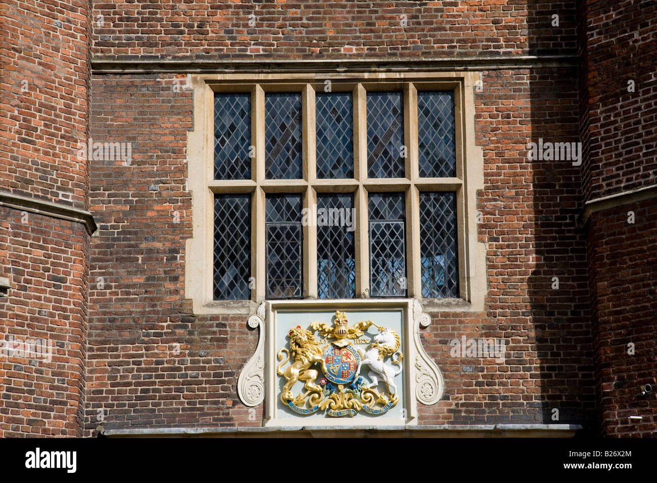 Window and a crest on the front of the Hospital of the Blessed Trinity or Abbot's Hospital, Guildford, Surrey, England. Stock Photo