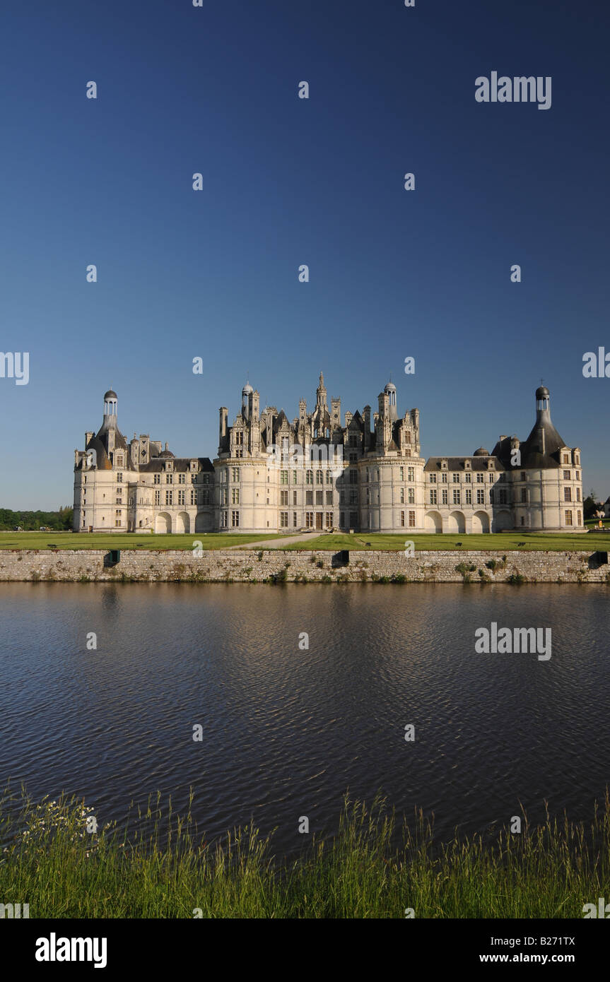 The royal Château de Chambord with pond in front Stock Photo