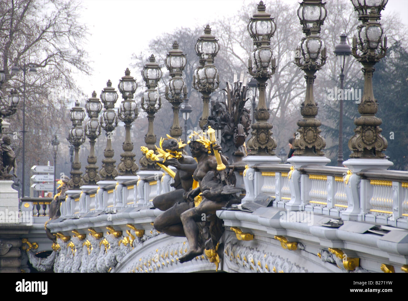 France, Paris, Lamp posts and statues on Pont Alexandre III Stock Photo