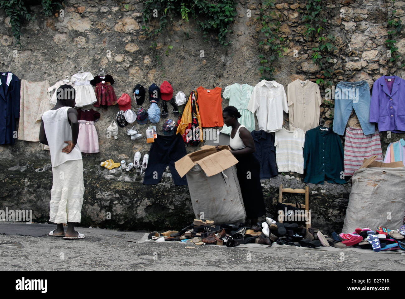 Haitian women selling and buying clothes on the market, Jacmel, Haiti