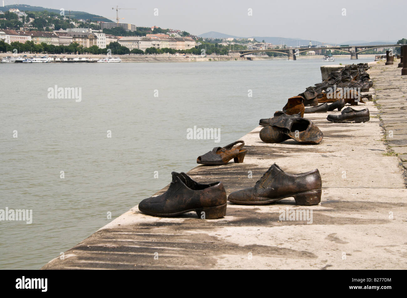 Shoes on the Danube - a memorial to the victims of the Arrow Cross Militiamen during WW2. Stock Photo