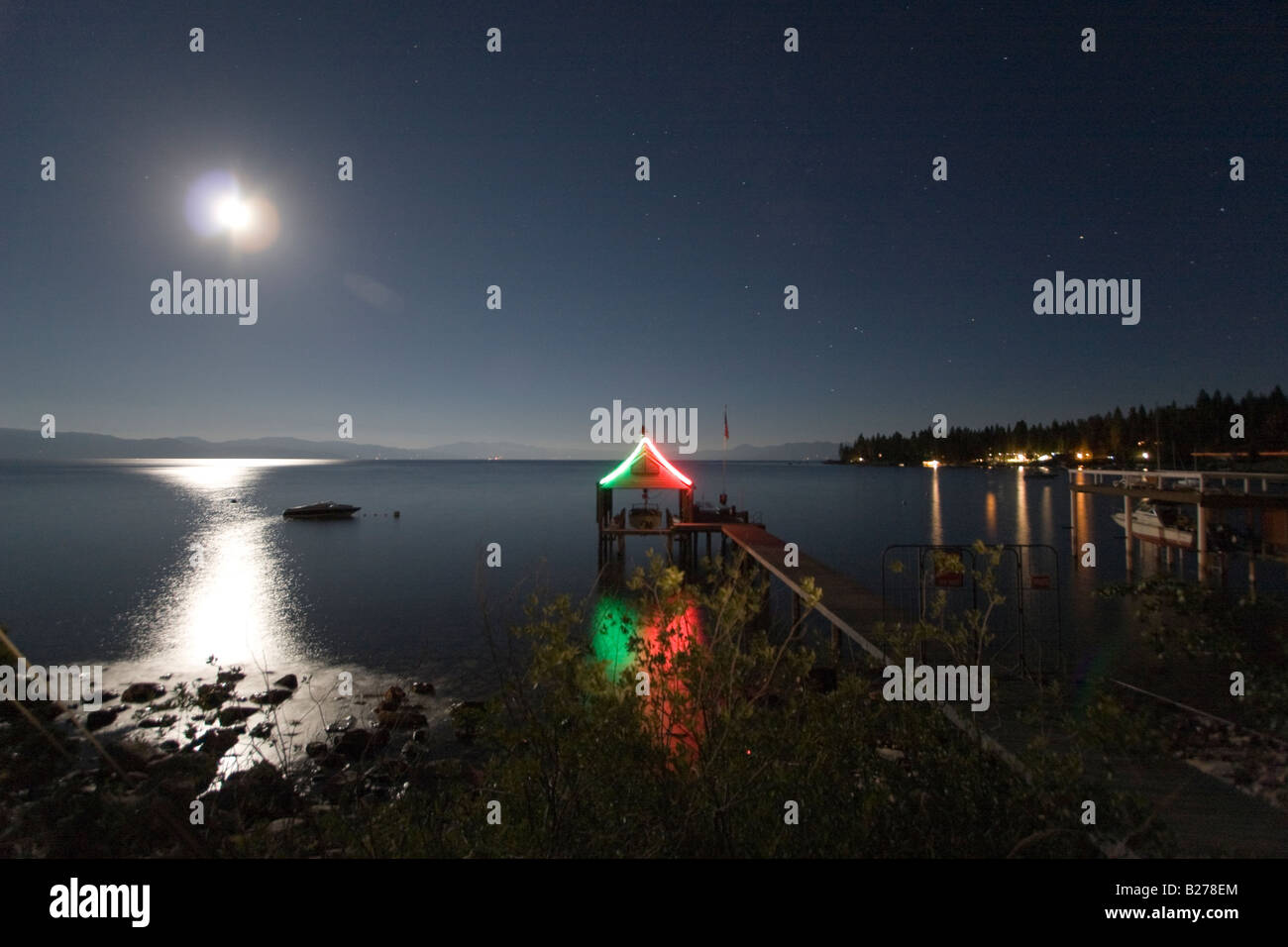 Holiday Christmas lights on a boat dock Stock Photo Alamy