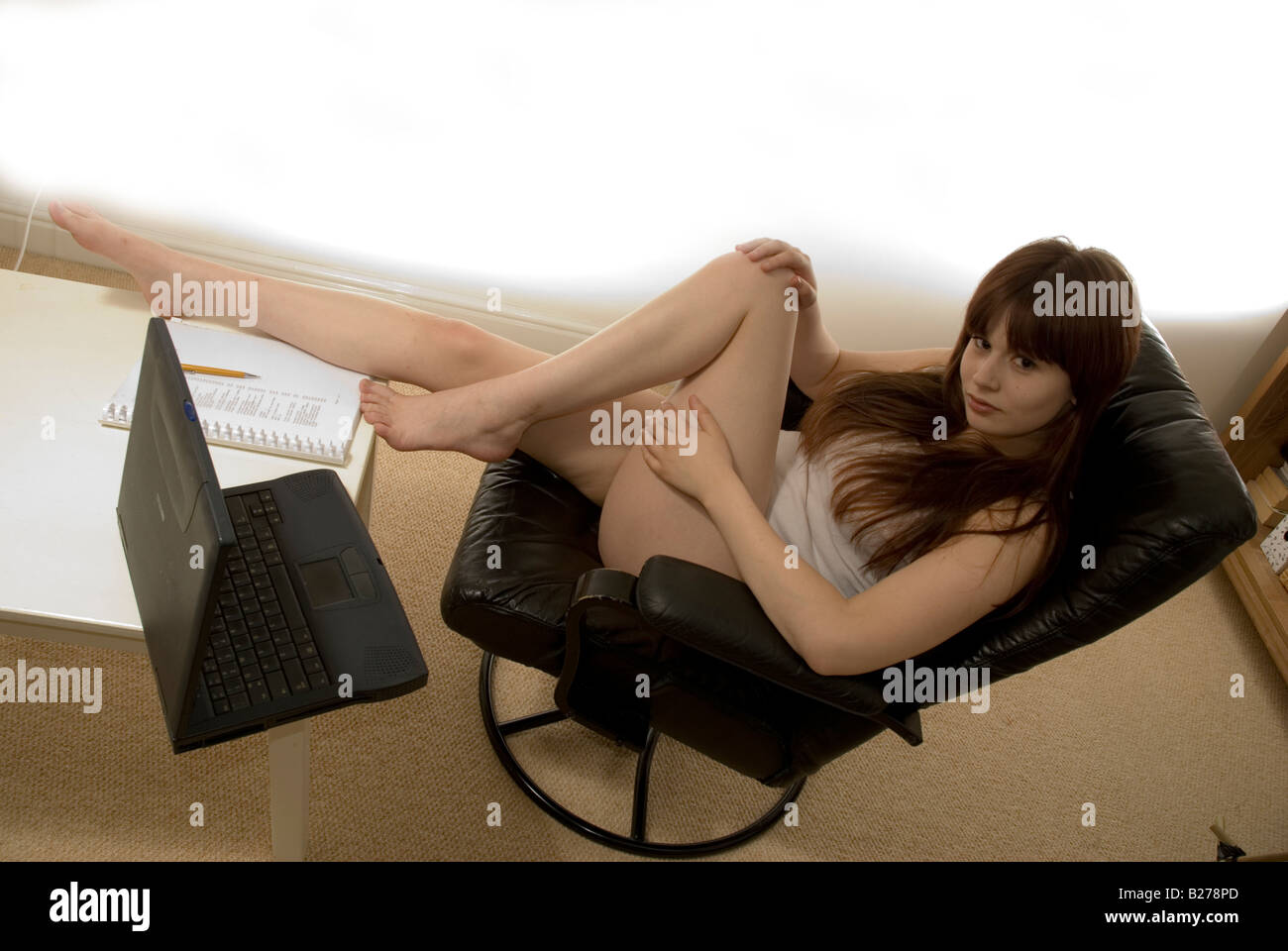 Home office girl working in underwear Stock Photo - Alamy