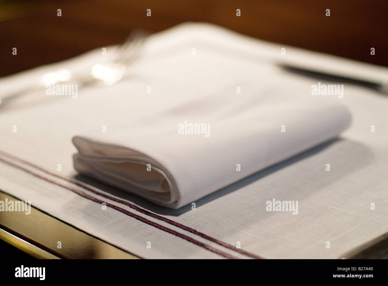 Breakfast place setting with linen napkin and silverware Cerise by Gordon Ramsay Conrad Hotel Tokyo. Stock Photo