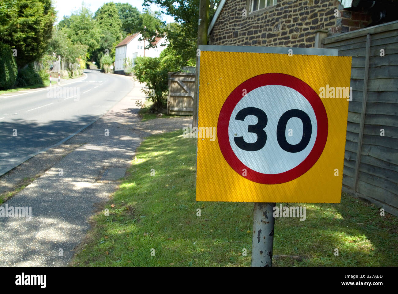 Thirty mph road speed sign on rural road Stock Photo