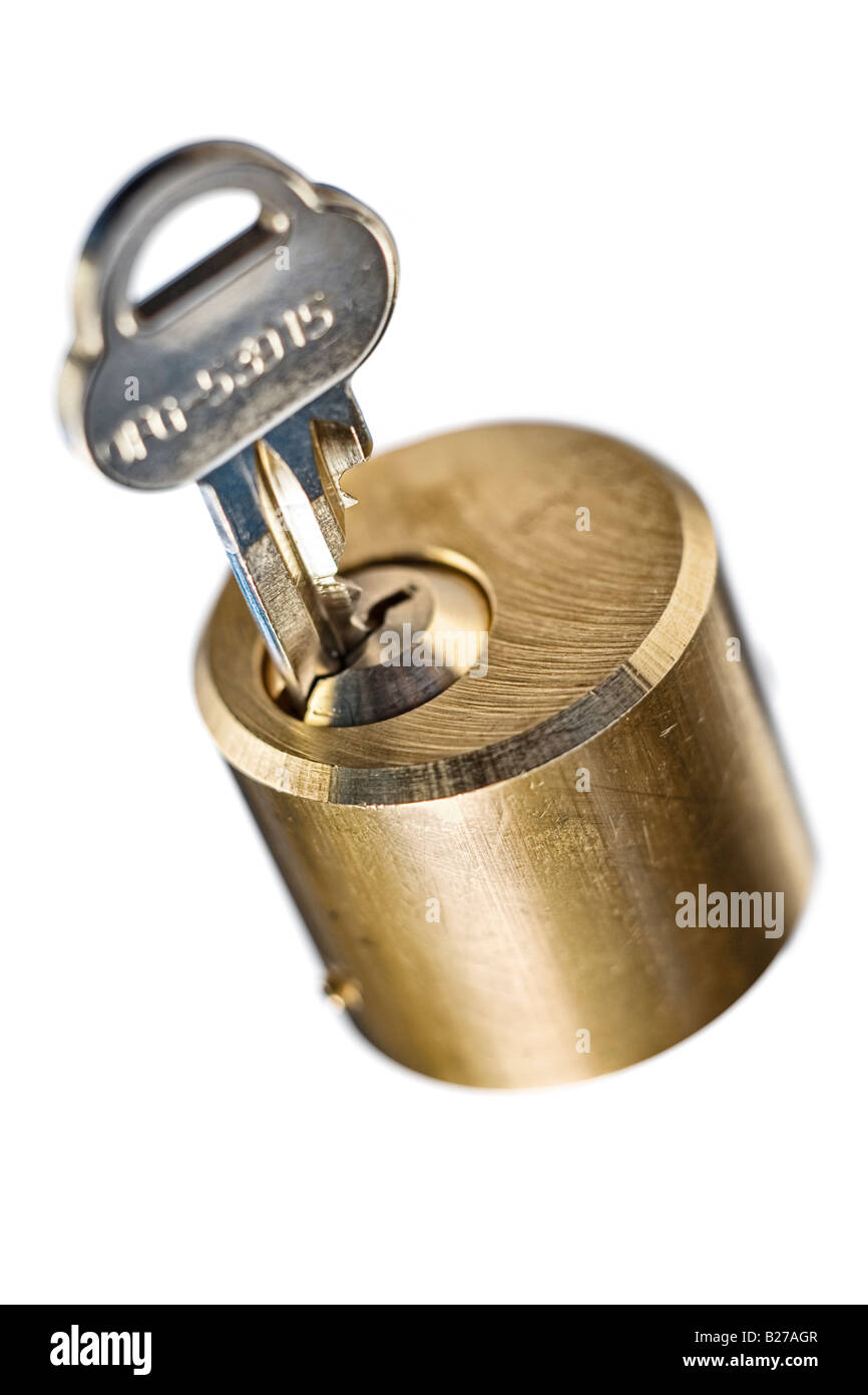 a key in a lock cylinder Stock Photo Alamy