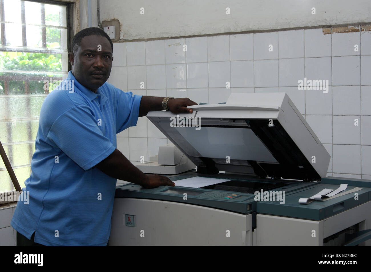 African man at a photocopier machine, Accra, Ghana Stock Photo Alamy