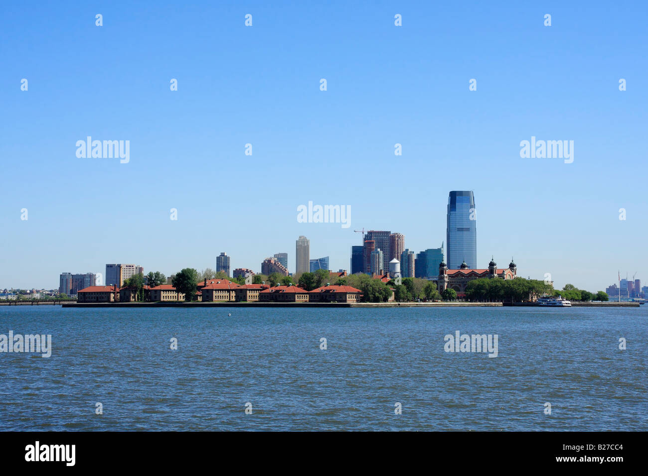 Ellis Island with New Jersey buildings in the background - New York City, USA Stock Photo