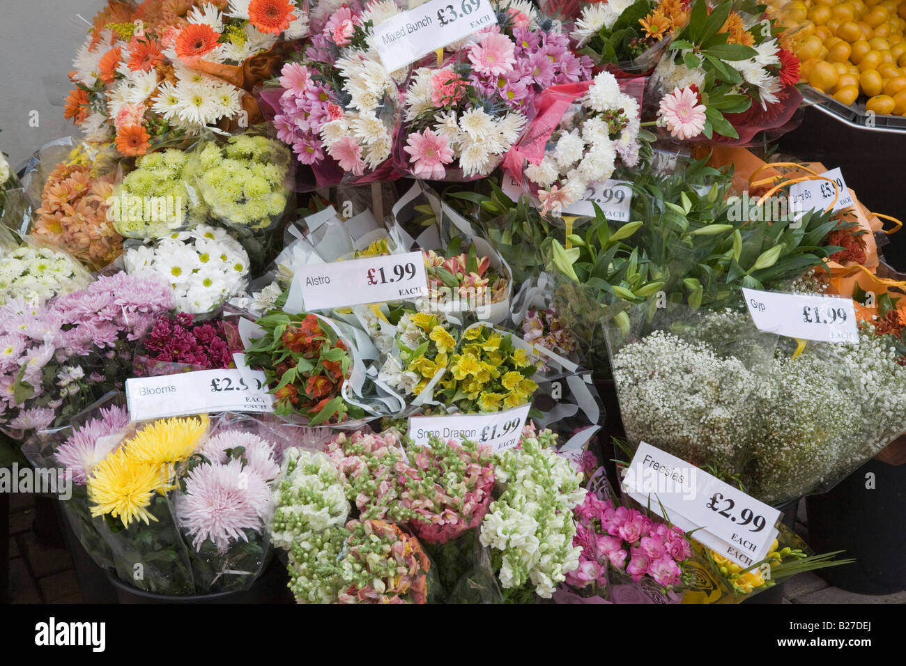 Britain UK Bunches of fresh flowers for sale with price labels Stock Photo