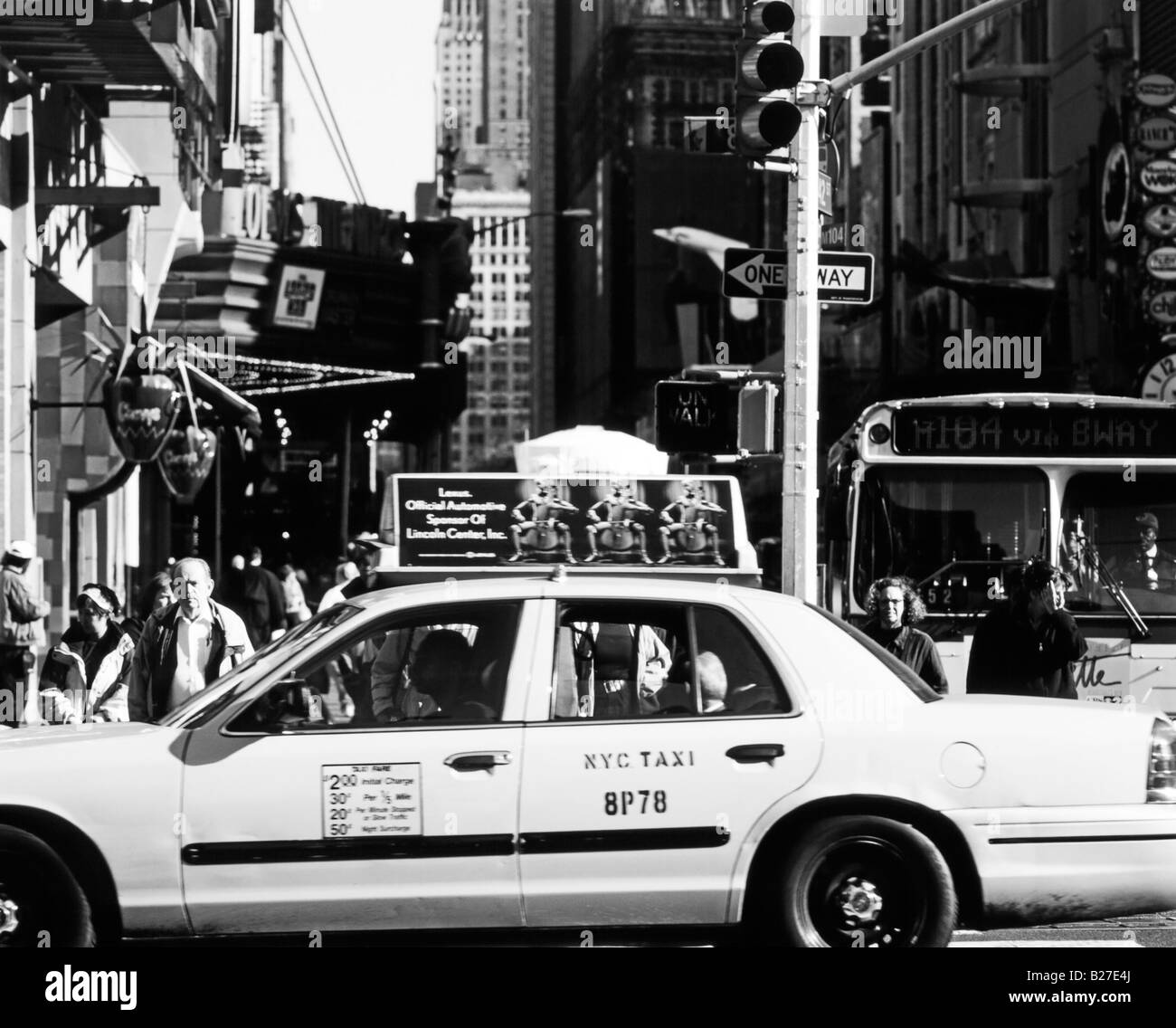 New York city taxicab and crowded busy Manhattan Street Scene, West 42 St, 8 Avenue, Manhattan, New York, New York State, North America, USA Stock Photo