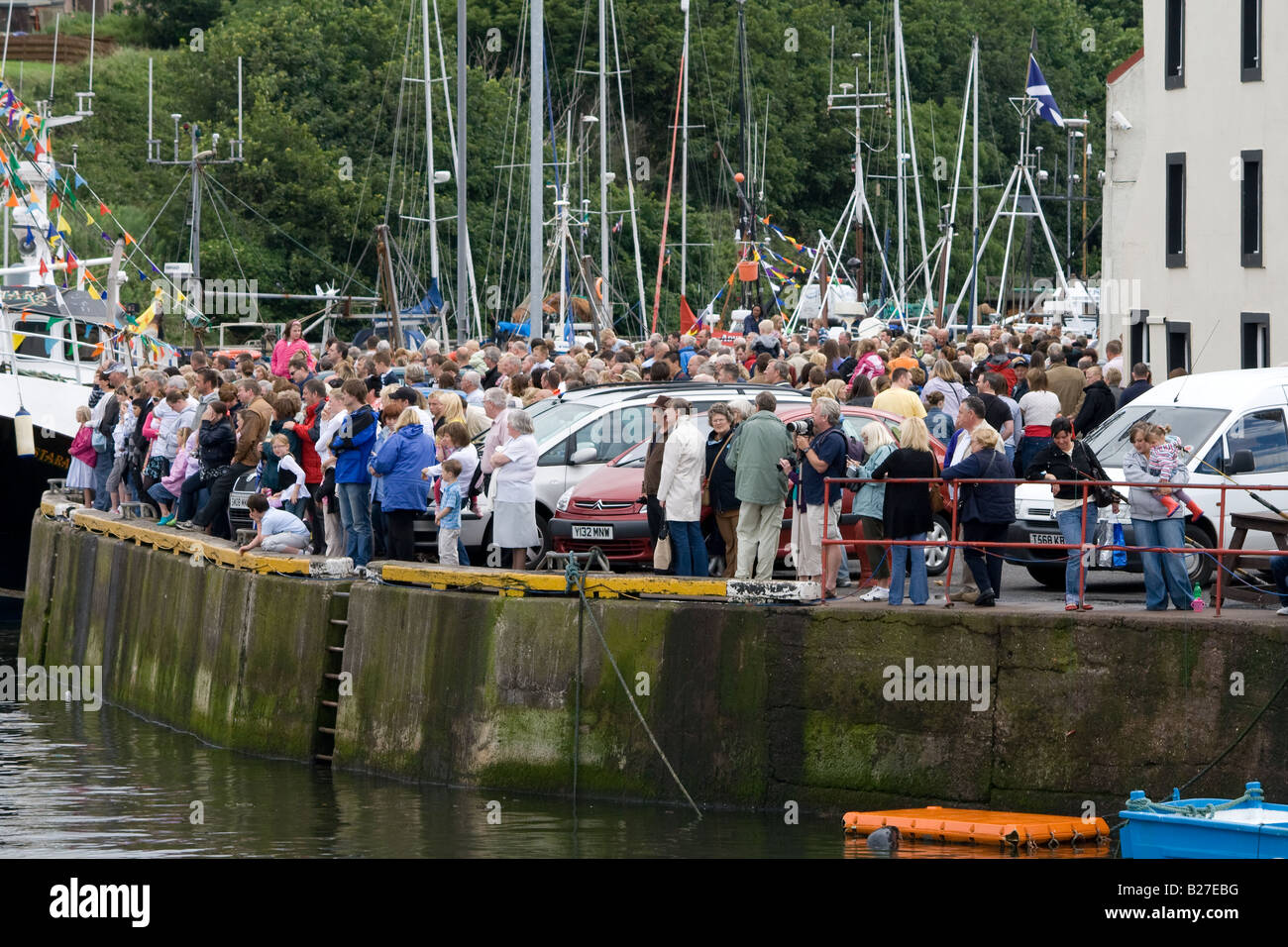 The crowds gather for Eyemouth Herring Queen Stock Photo Alamy
