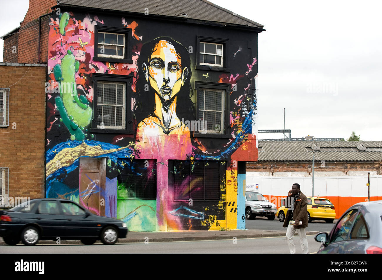 House building painted with gaudy mural in Digbeth in Birmingham Stock Photo